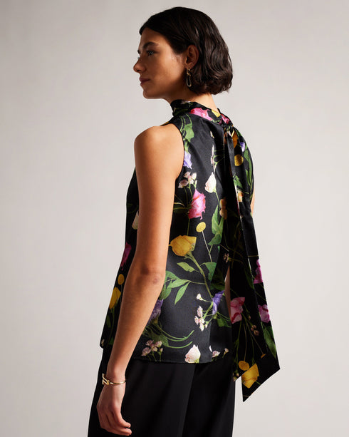DEMITRI-Tops-The ultimate wardrobe staple, DEMITRI has it all. The scattered bouquet print and oversized self-tie fastening are the perfect combination for a stylish look that will elevate whatever jeans, skirt or trousers you pair with it. The fabric of this product is made with 100% recycled polyester. Using recycled polyester helps divert plastic waste from ending in landfills, and helps us to reduce our dependence on virgin materials. Sleeveless top Scattered bouquet print Cowl neck Oversized self-tie f